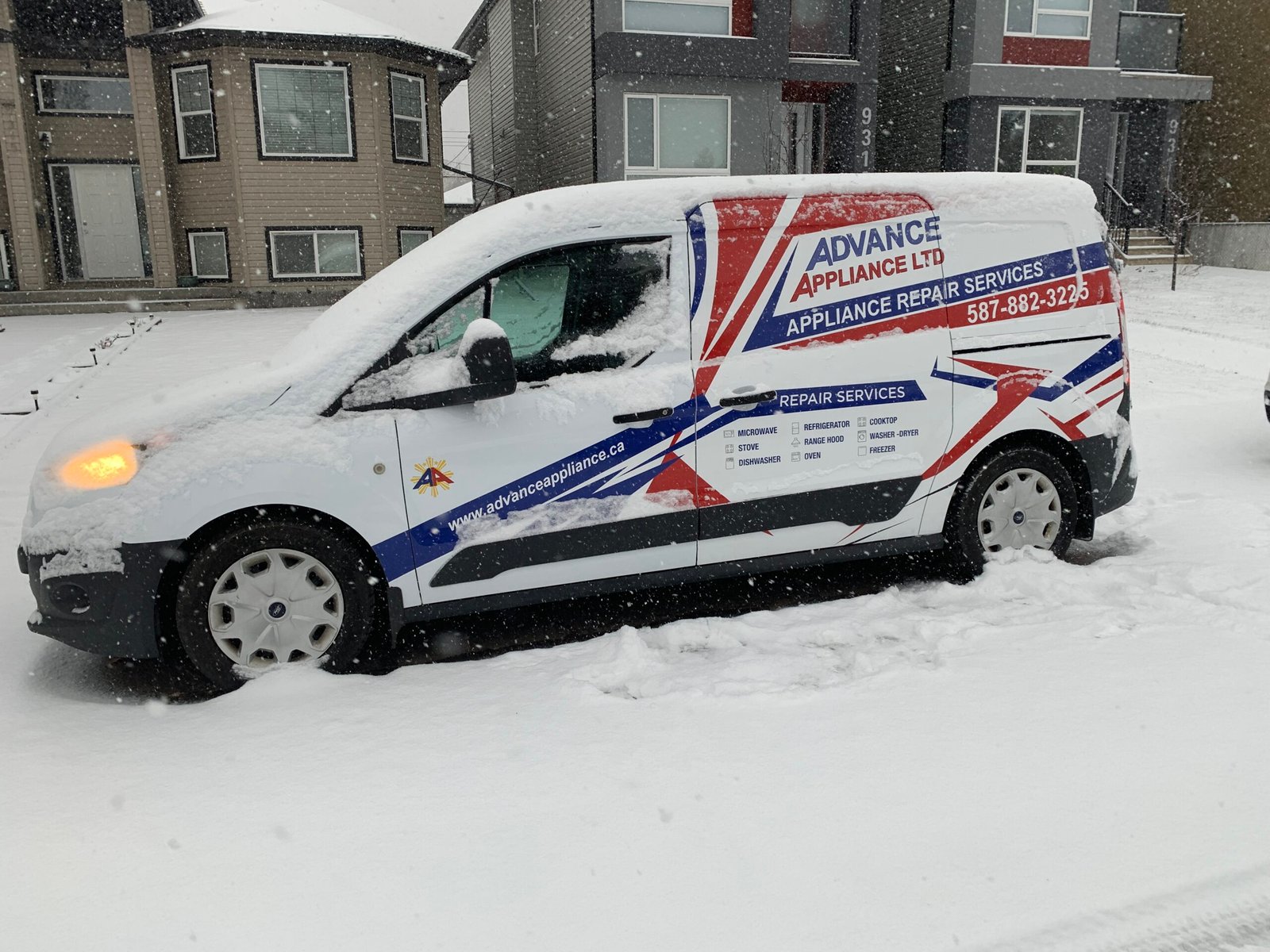 Advance Appliance Ltd service van during Edmonton snow season